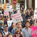 800px-Occupy_Oakland_99_Percent_signs creative commons